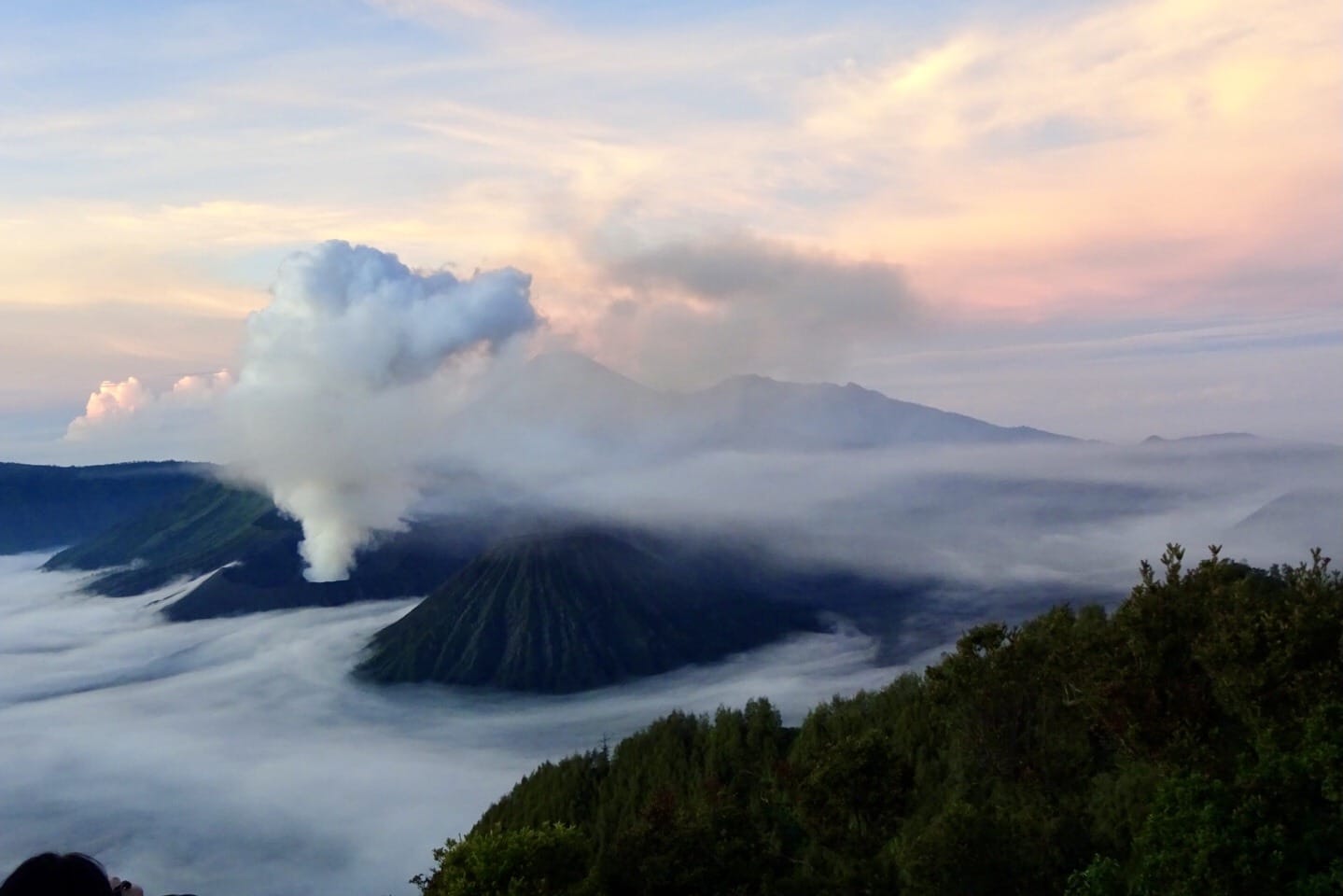 This image shows the sun rising over the Mt Bromo volcano on the island of Java in Indonesia. As can be seen, this volcano is very active, with plumes of white smoke being emitted into the air. This image is included in the post to show the reader some of the wonderful places they could visit while backpacking in Southeast Asia. The links associated with the photograph provide the reader with information regarding how they might access Mt Bromo from the nearby city of Yogyakarta.