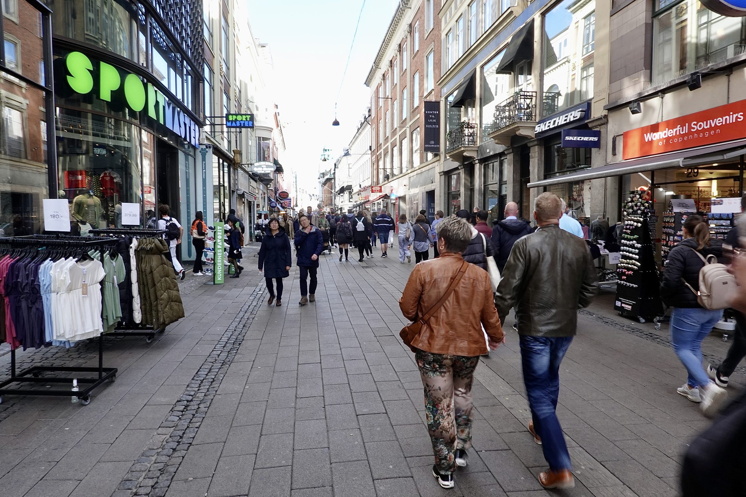 Stroget, the main shopping street in Copenhagen, featuring low value retail stores at the entrance to the street. The quality of the shops within Stroget improves as you walk on till you reach Amagertorv where you are in the world 0f Prada, Gucci, Burberry and Cartier.